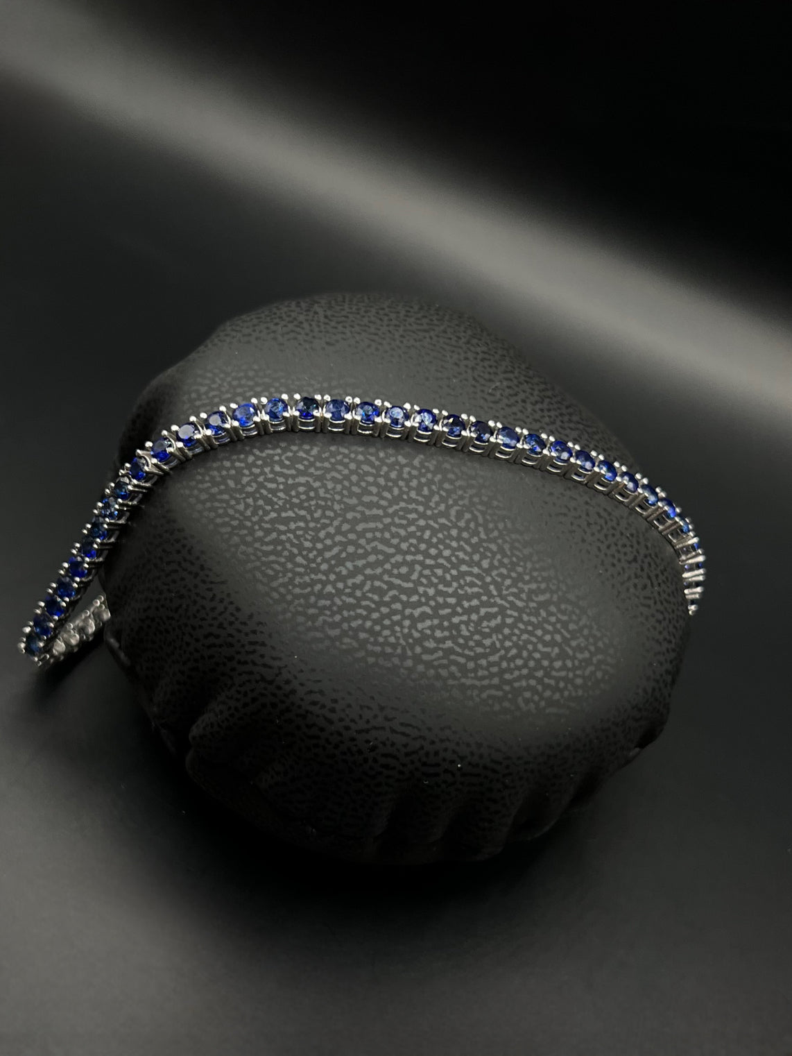 Tennis white gold bracelets with dark blue natural sapphires